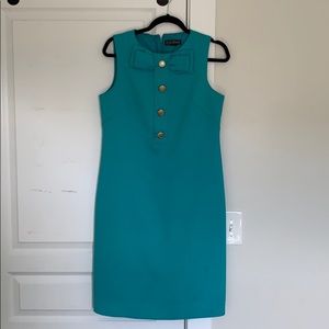 No sleeve semi-formal dress with gold buttons